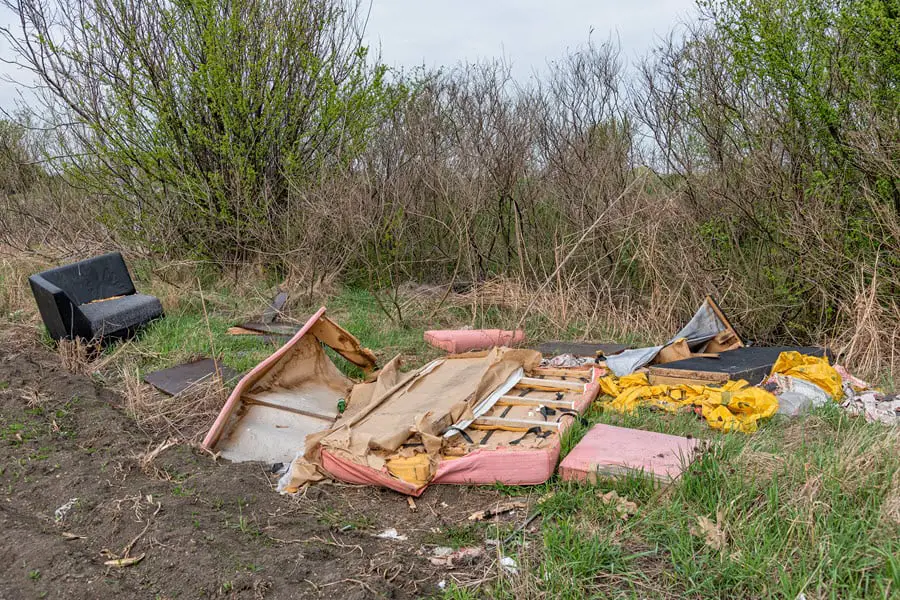 fly tipping at the side of the road