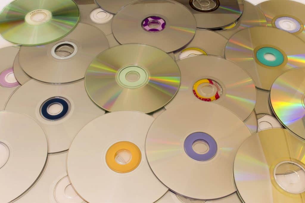 CD and DVD discs scattered in a pile