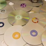 CD and DVD discs scattered in a pile