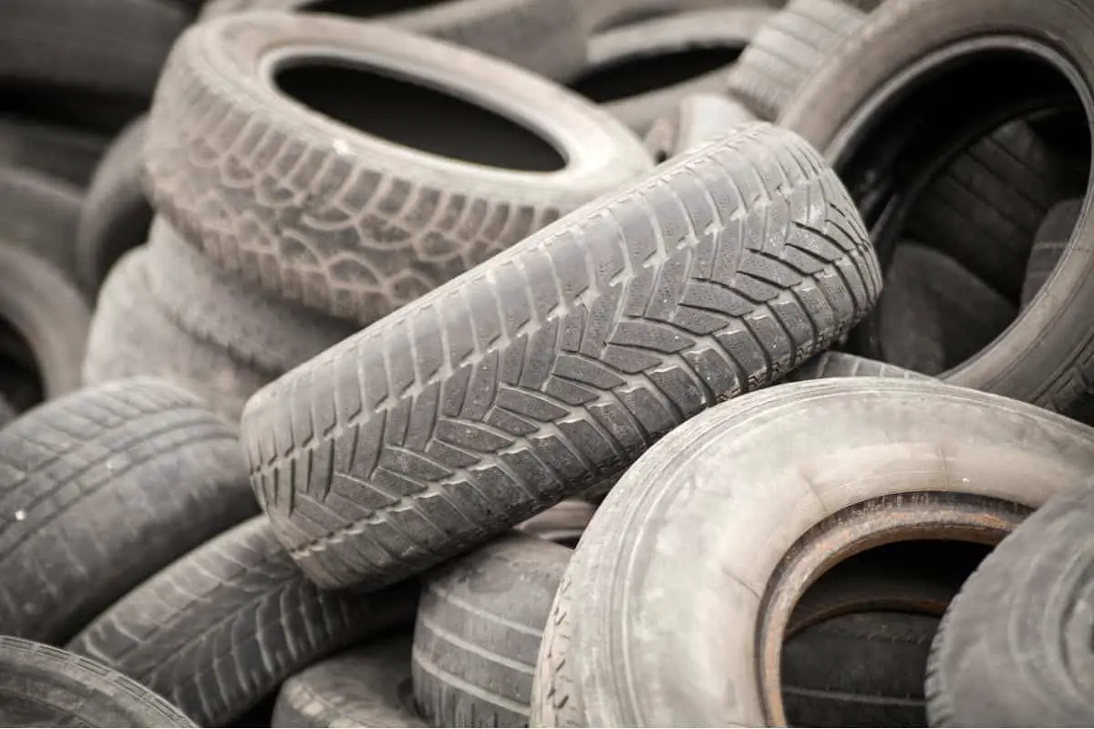 pile of old tyres for recycling