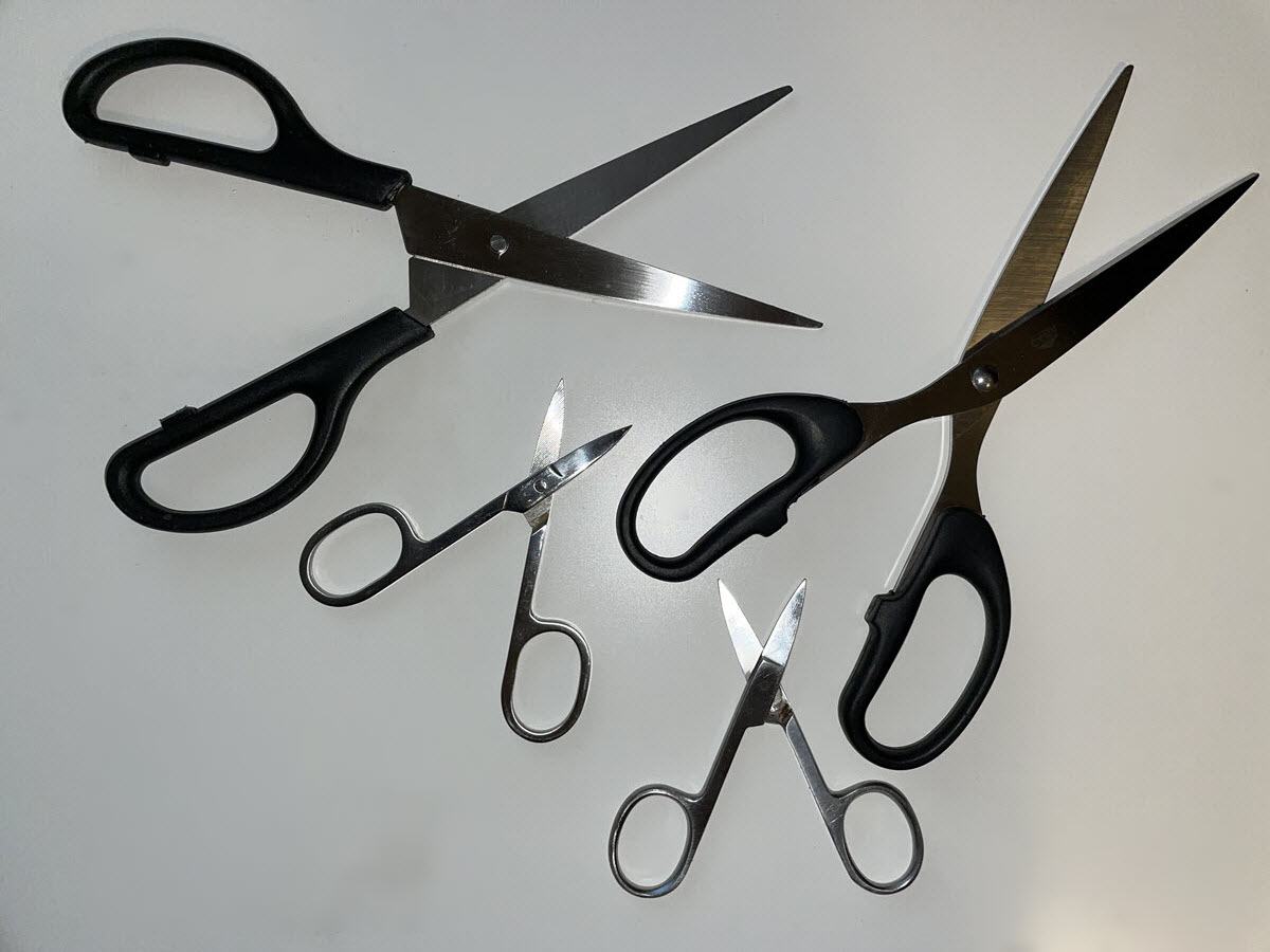 four pairs of scissors